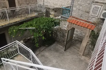 For sale a historic stone house with a garden and surrounding area