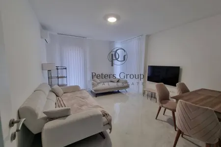 For sale large, bright three-bedroom apartment in a premium building in Budva