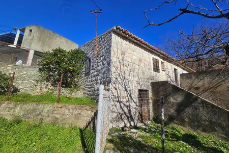 Legal stone house with a large plot