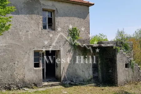 Two-storey stone house for renovation with a spacious plot in Sotonici