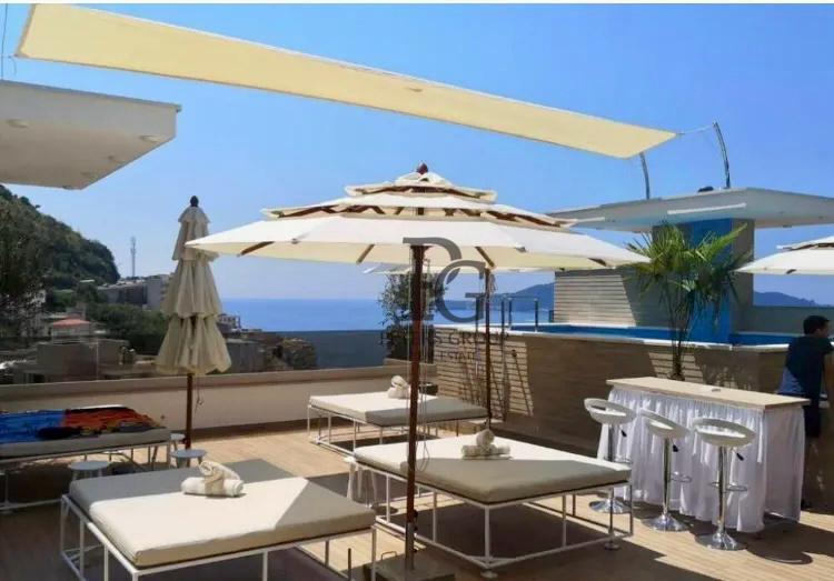 Studio apartment with a large terrace in a complex with a swimming pool in Rafailovici for sale