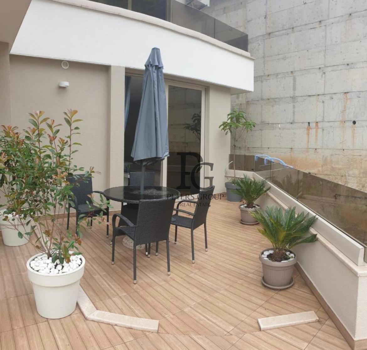 Studio apartment with a large terrace in a complex with a swimming pool in Rafailovici for sale