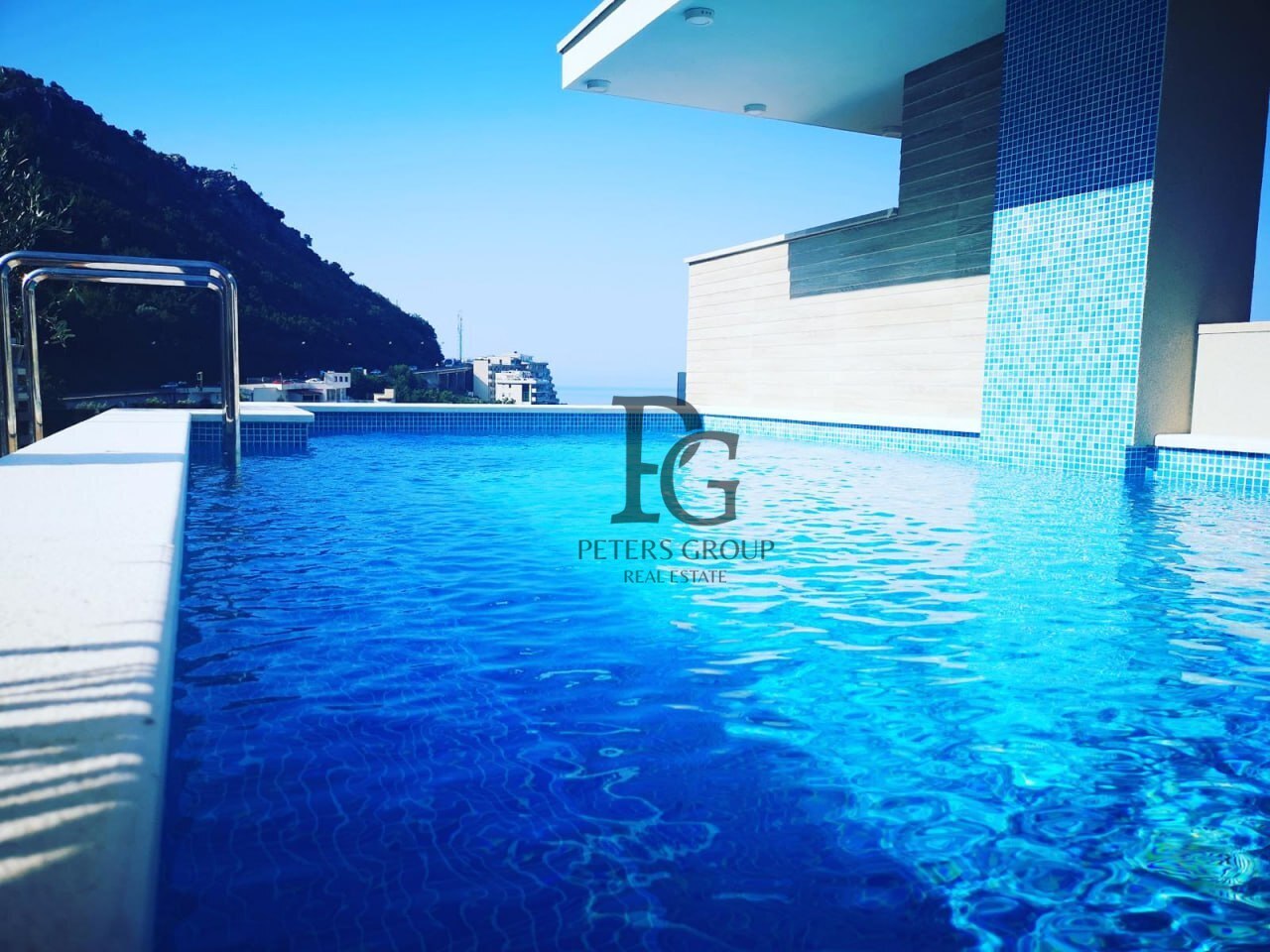 Studio apartment with a large terrace in a complex with a swimming pool in Rafailovici for sale