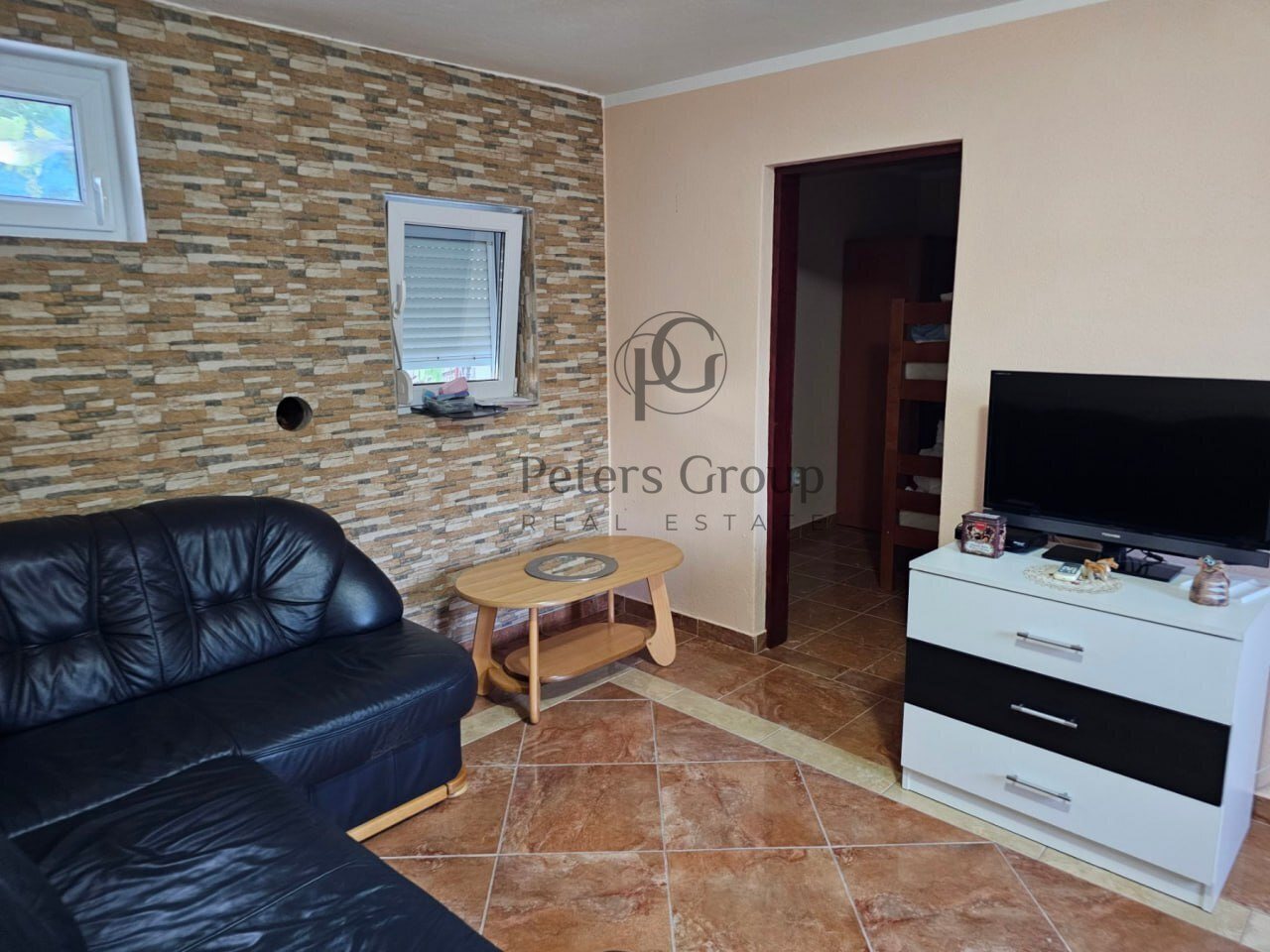 Compact Furnished Home with Sea Views on Flat Plot near Town