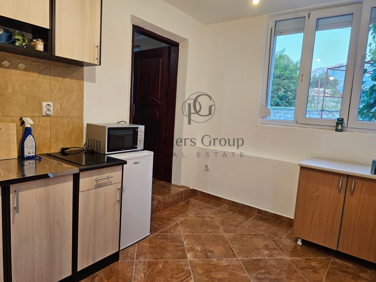 Compact Furnished Home with Sea Views on Flat Plot near Town