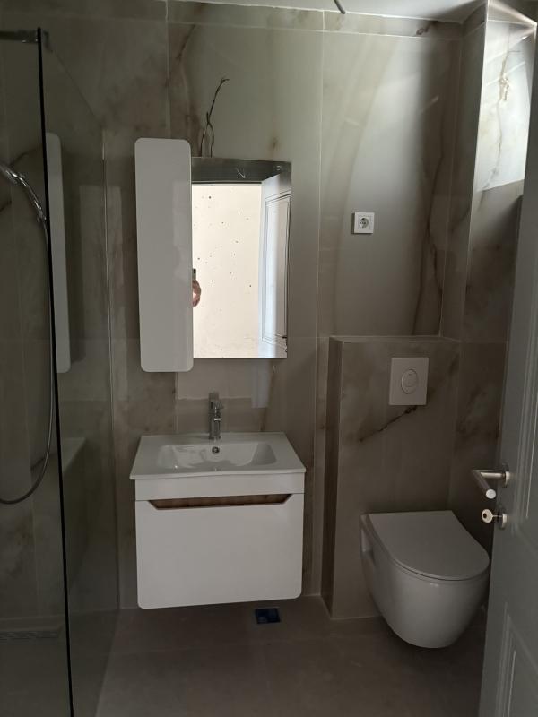 A 2-bedroom apartment for sale in a complex under construction in Baošići.
