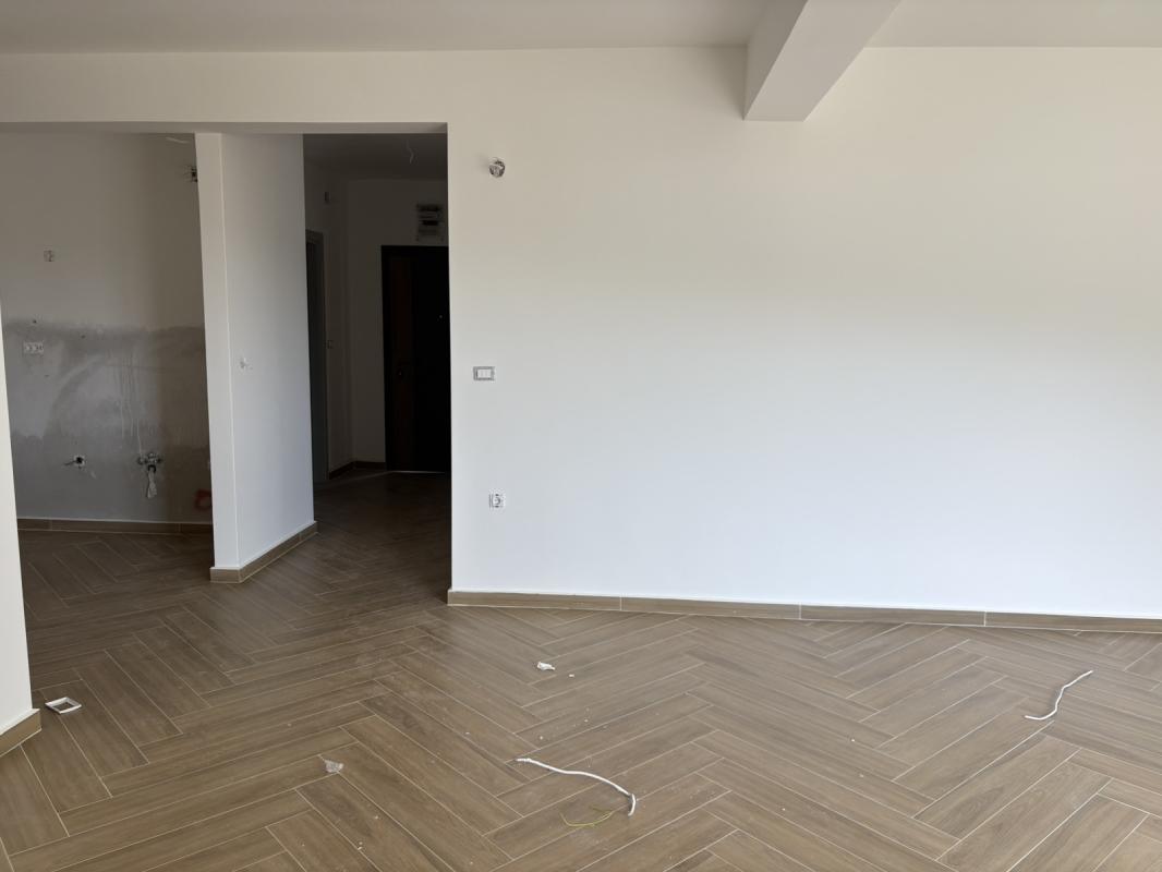 A 2-bedroom apartment for sale in a complex under construction in Baošići.