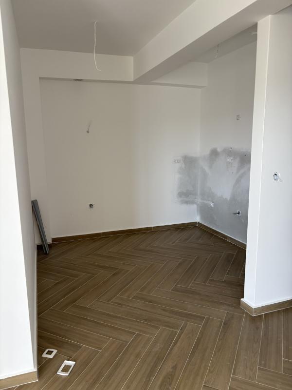 A 2-bedroom apartment for sale in a complex under construction in Baošići.