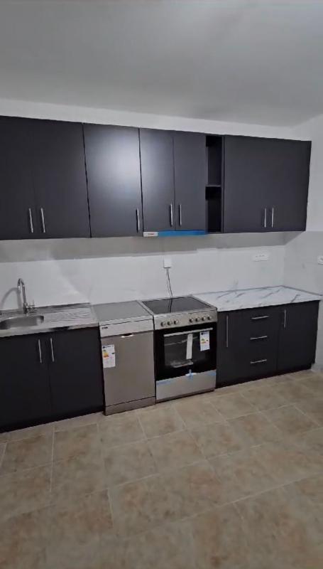 A house in Polye with a plot of land, a bar for rent for a long time