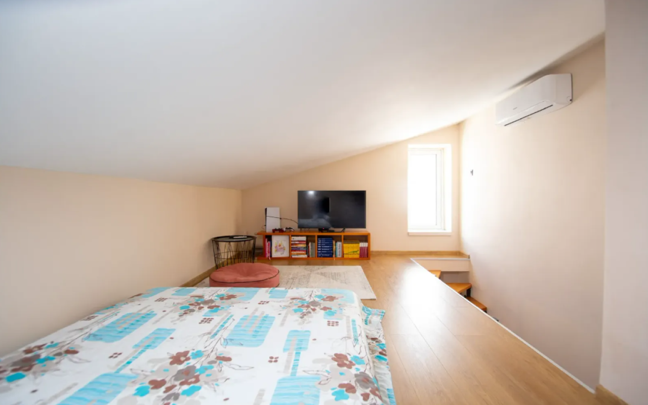 Apartment for sale with a large roof terrace in Budva