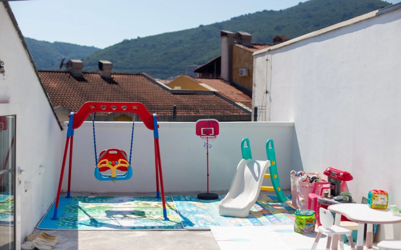 Apartment for sale with a large roof terrace in Budva