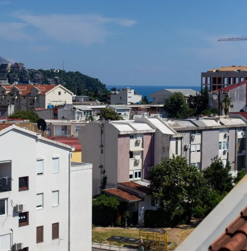 Apartment for sale with a large roof terrace in Budva
