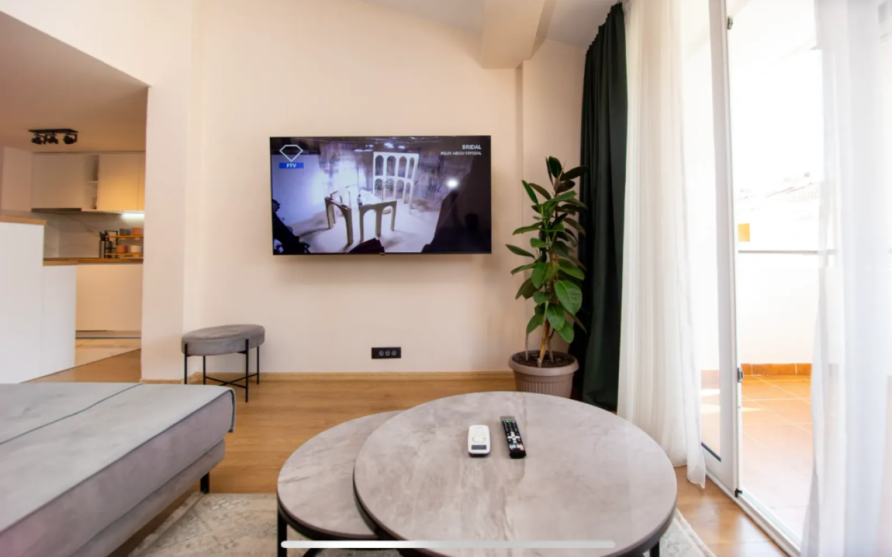 Apartment for sale with a large roof terrace in Budva