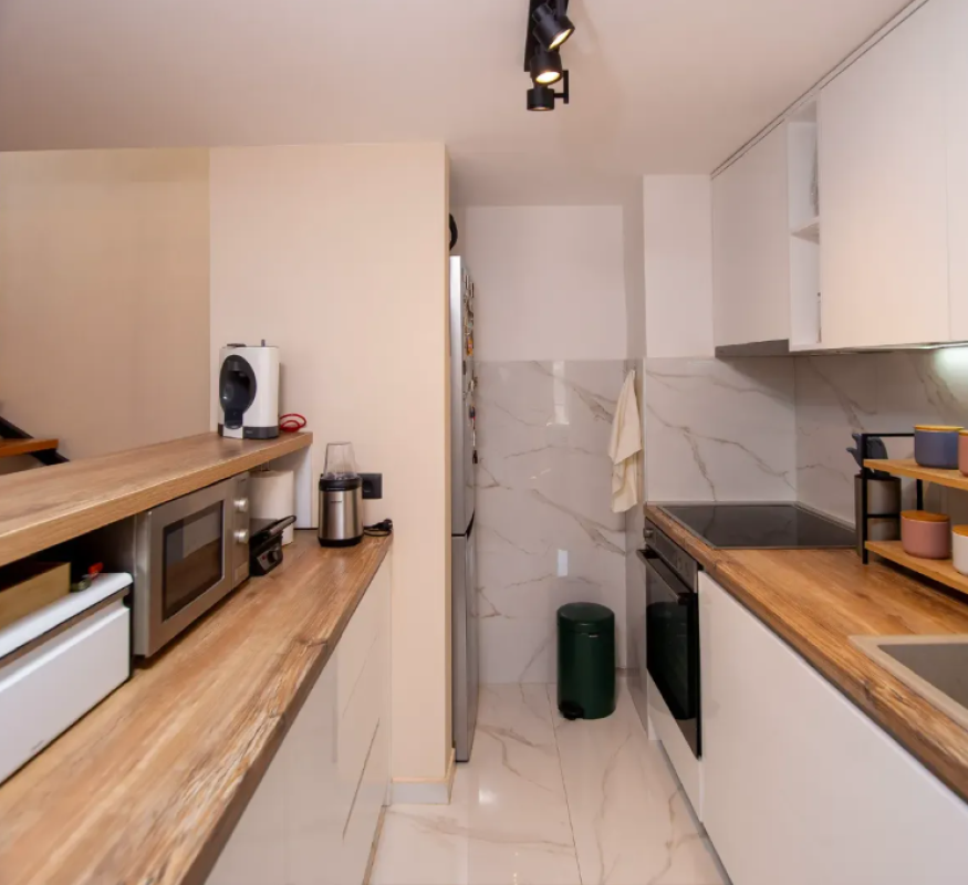 Apartment for sale with a large roof terrace in Budva