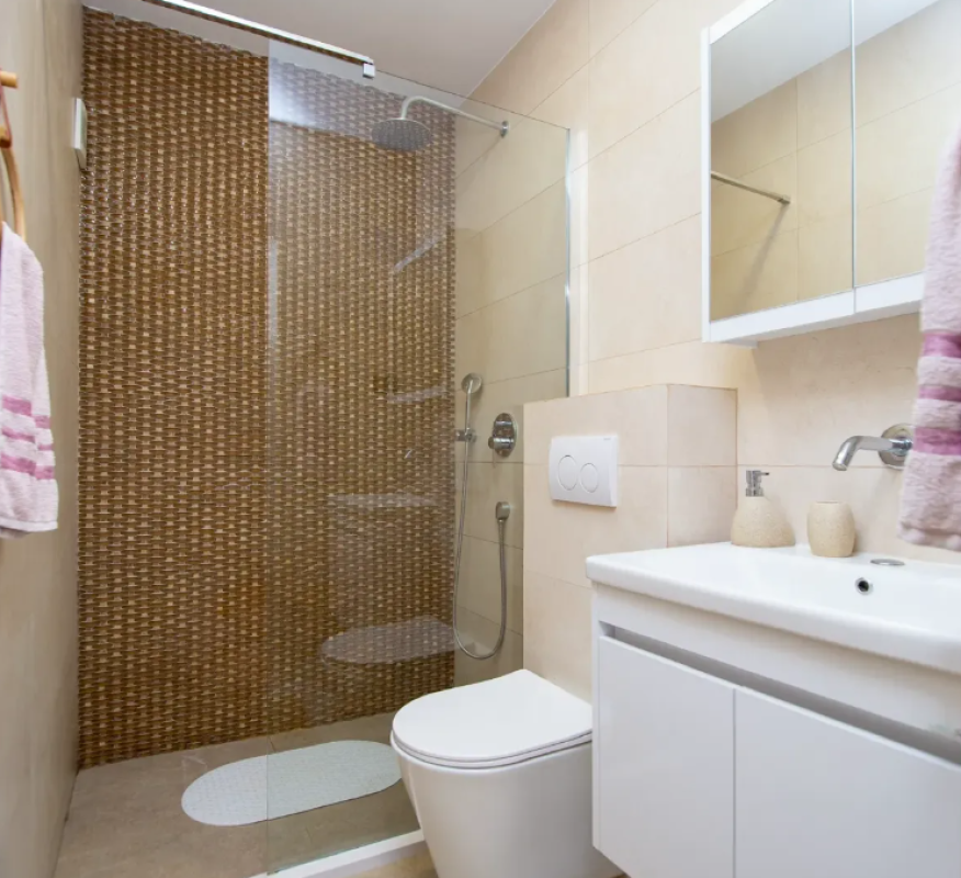 Apartment for sale with a large roof terrace in Budva