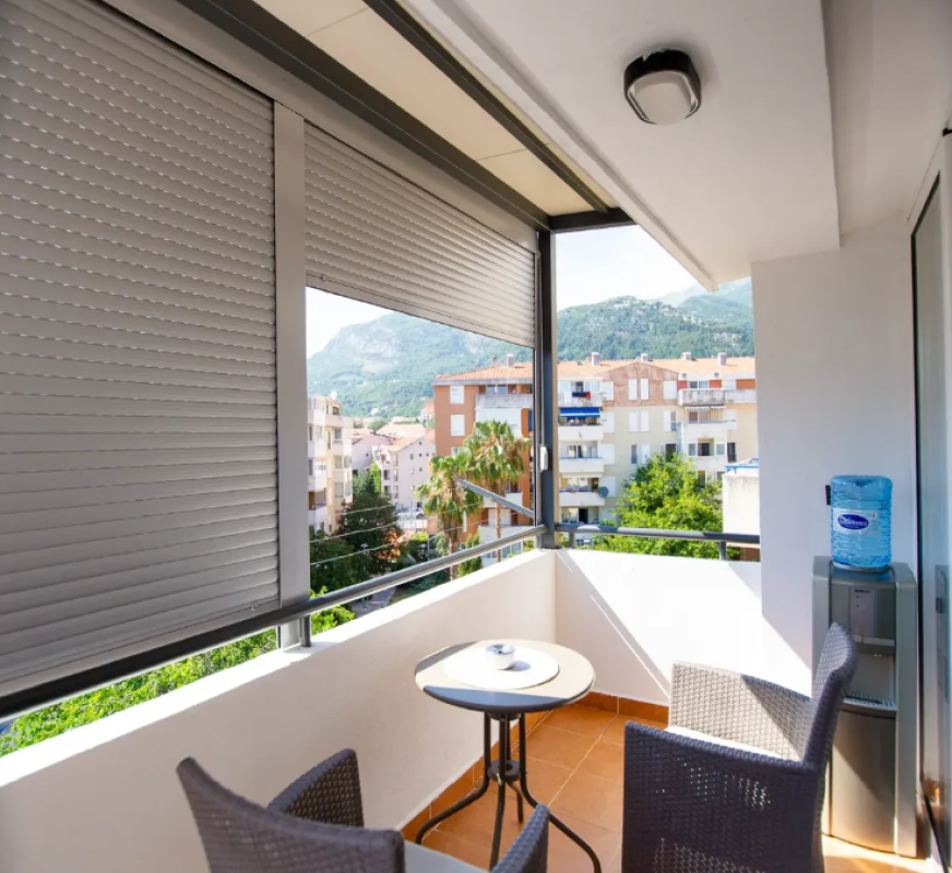 Apartment for sale with a large roof terrace in Budva
