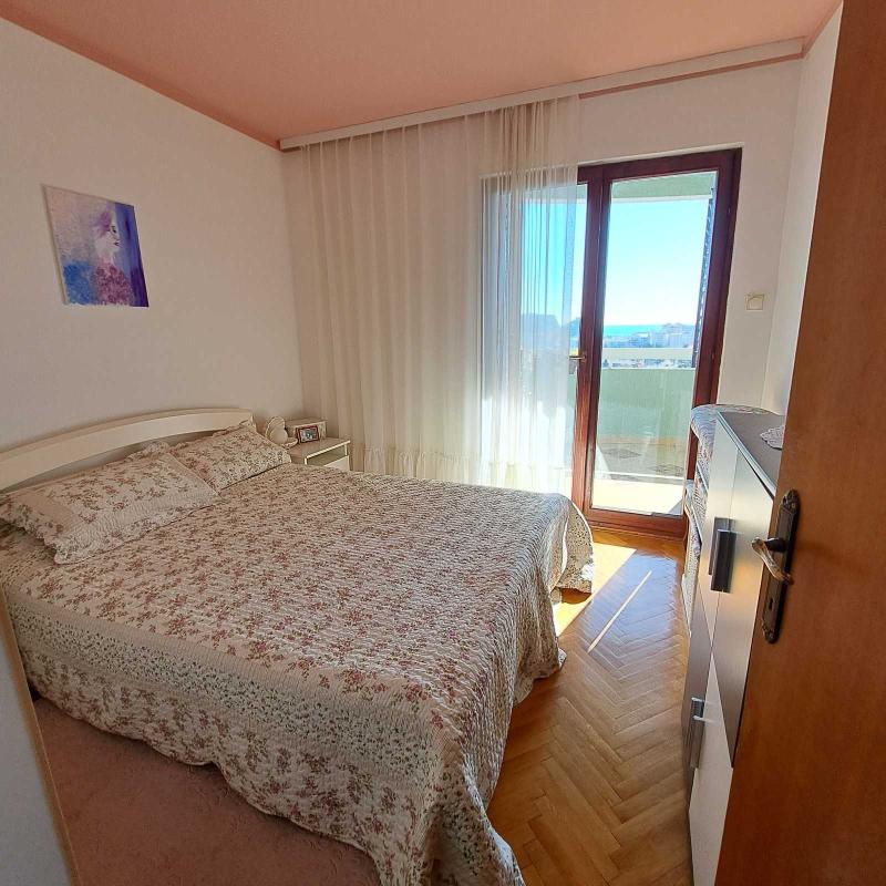 Apartment for sale with garage and sea view in Budva.