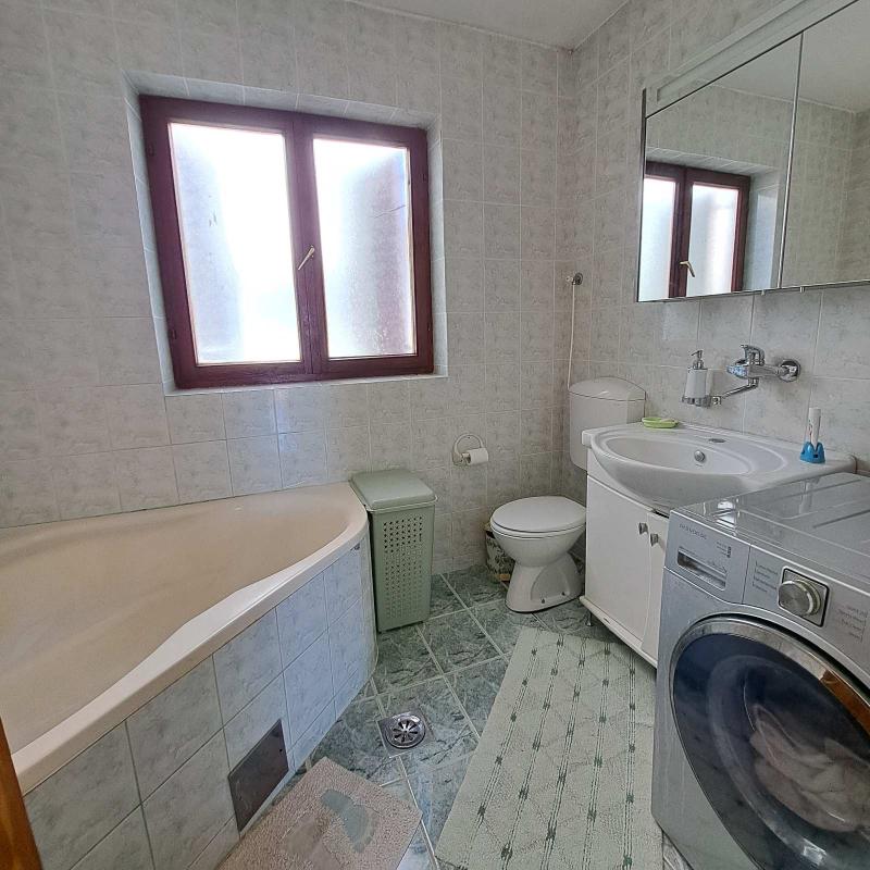 Apartment for sale with garage and sea view in Budva.