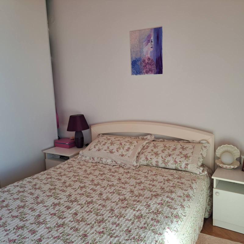 Apartment for sale with garage and sea view in Budva.