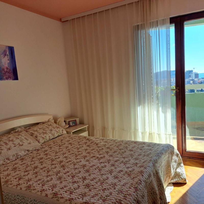 Apartment for sale with garage and sea view in Budva.