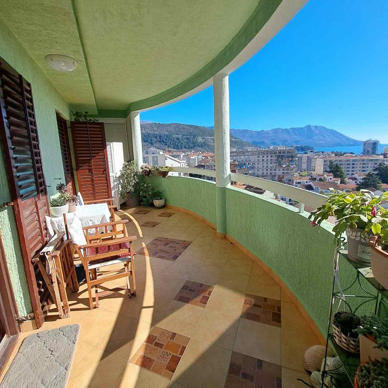 Apartment for sale with garage and sea view in Budva.