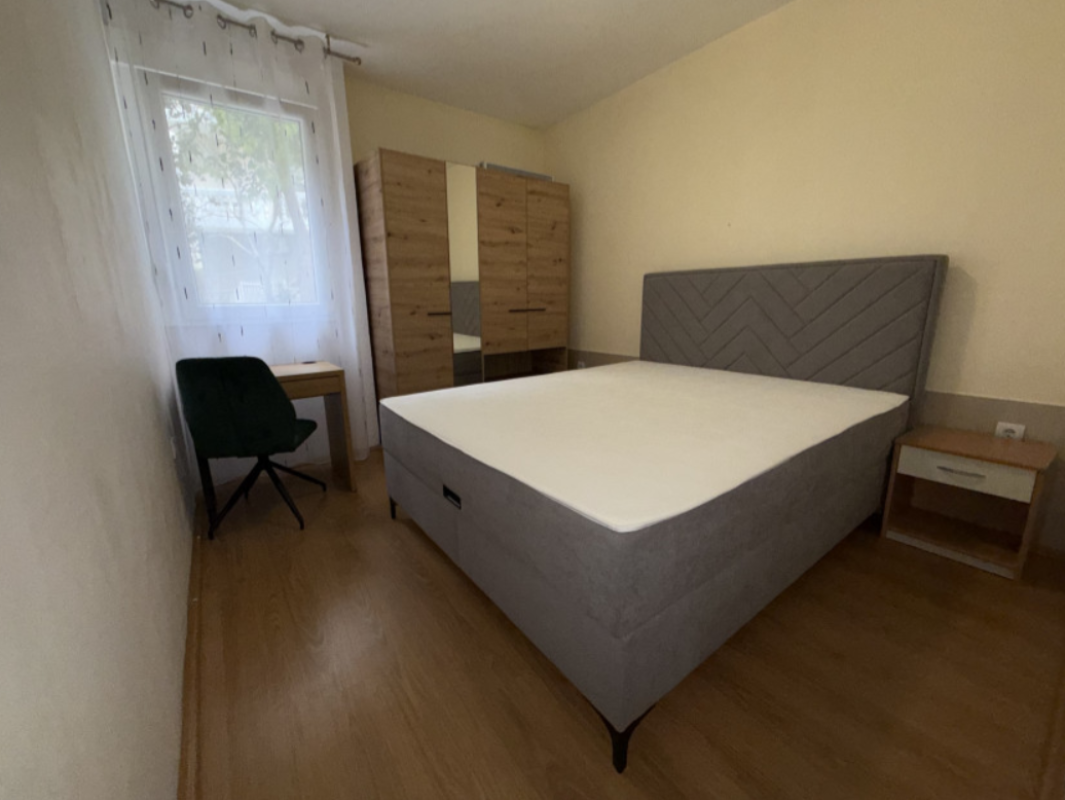 Apartment with 2 bedrooms and a courtyard for sale in Budva.