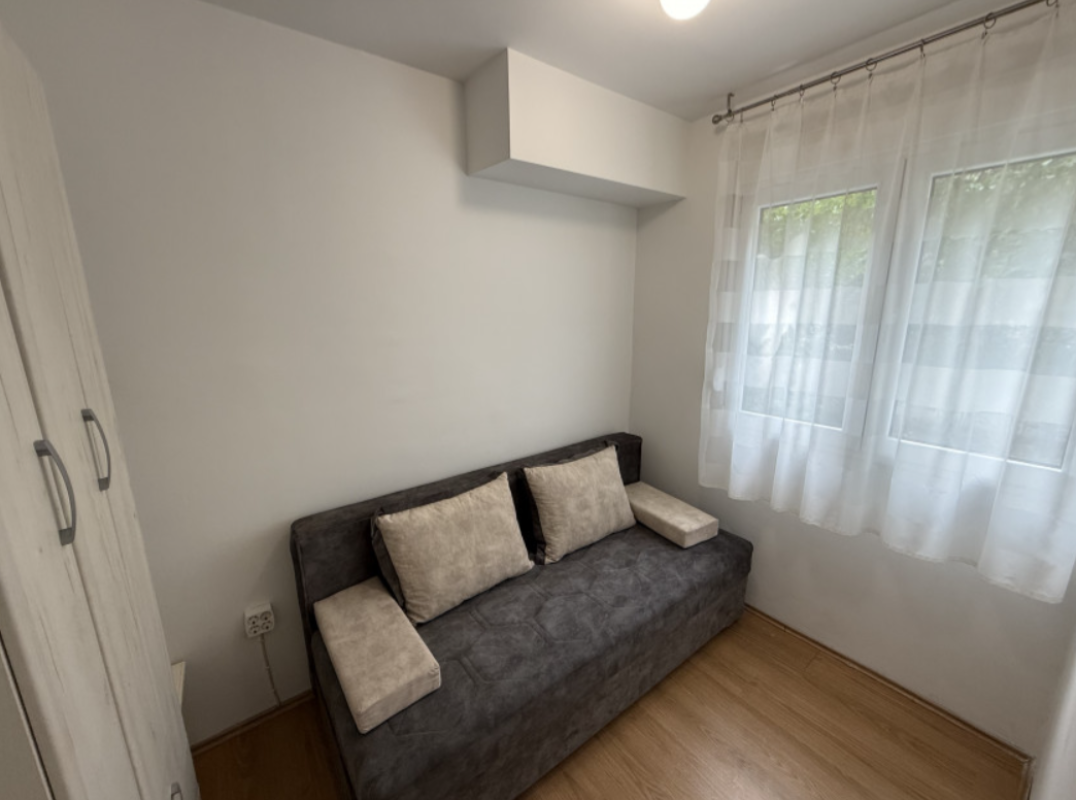 Apartment with 2 bedrooms and a courtyard for sale in Budva.