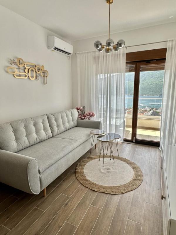 Apartment with sea view for sale in Đenovići.