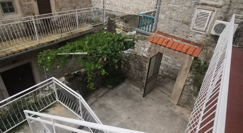 For sale a historic stone house with a garden and surrounding area