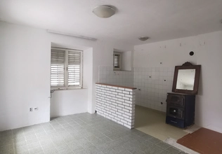 For sale a historic stone house with a garden and surrounding area