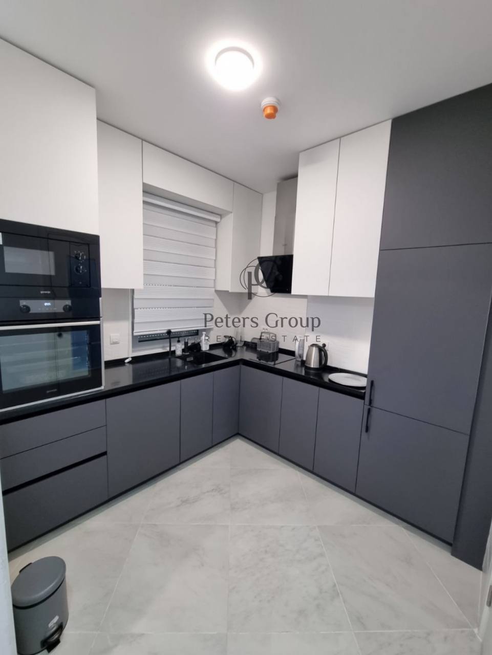 For sale large, bright three-bedroom apartment in a premium building in Budva