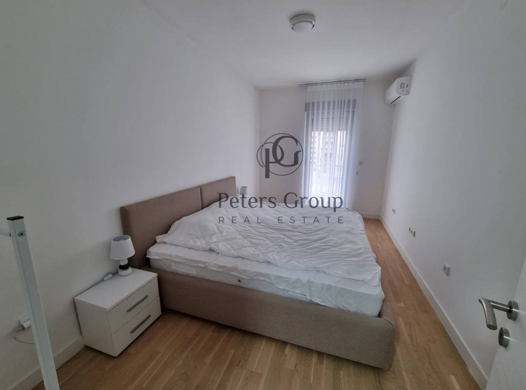For sale large, bright three-bedroom apartment in a premium building in Budva