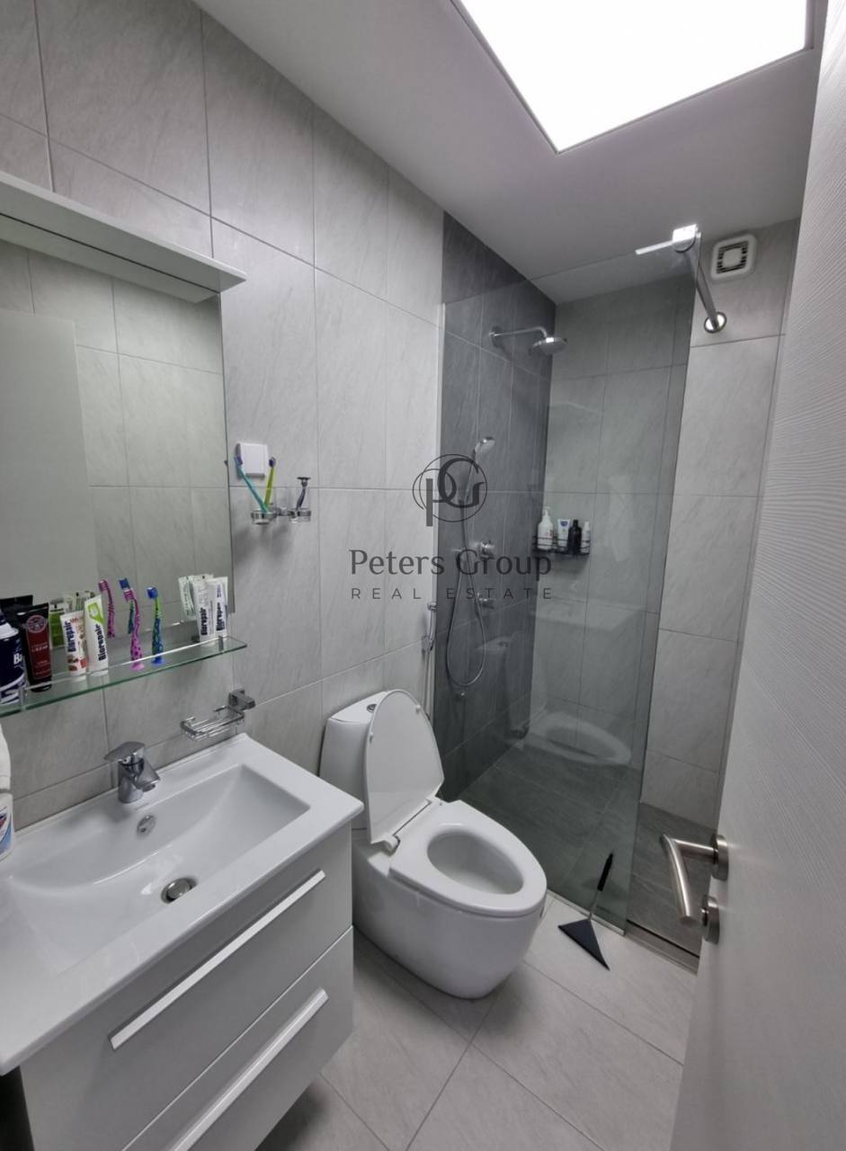 For sale large, bright three-bedroom apartment in a premium building in Budva