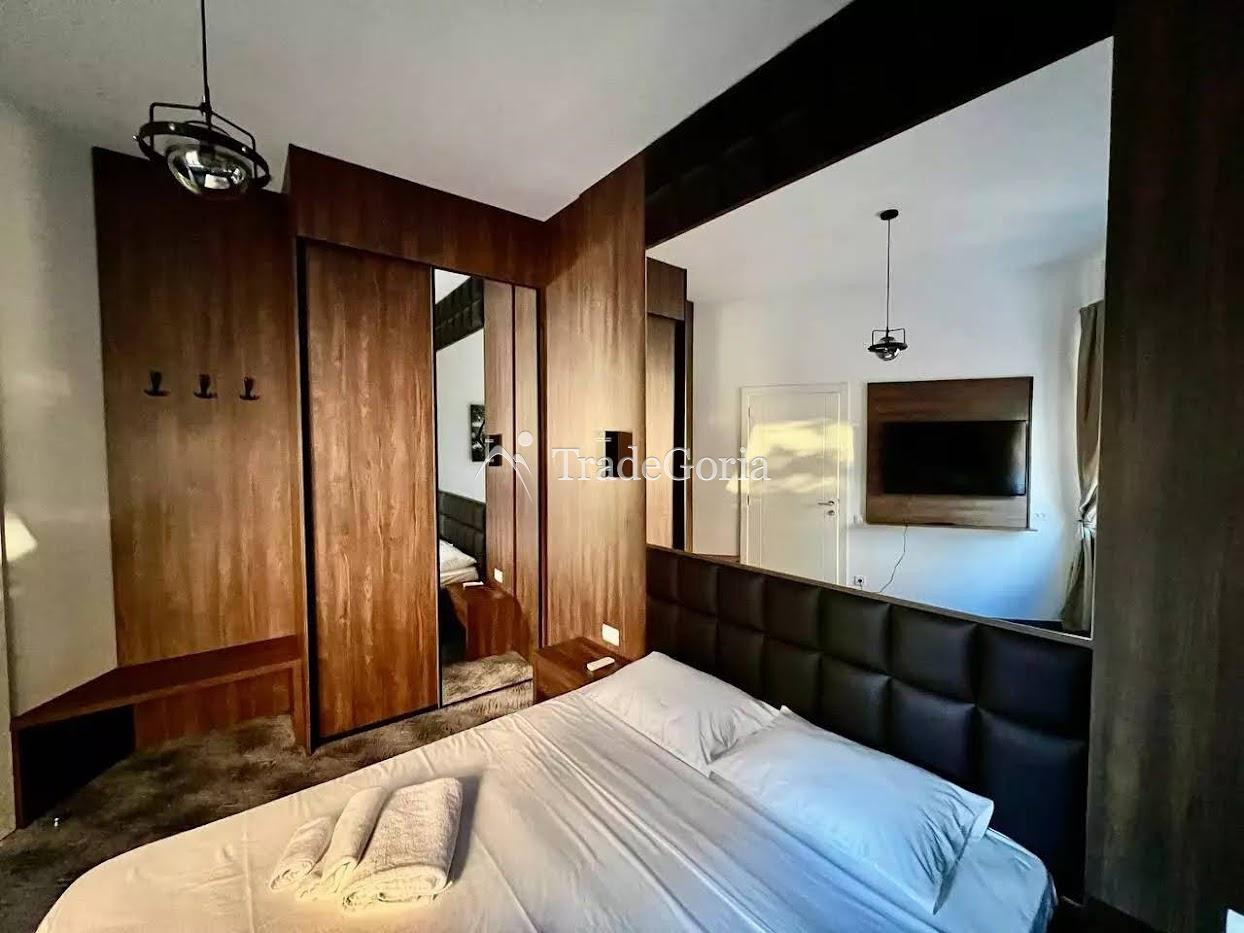 Apartment in a residential complex with a pool, spa, and gym
