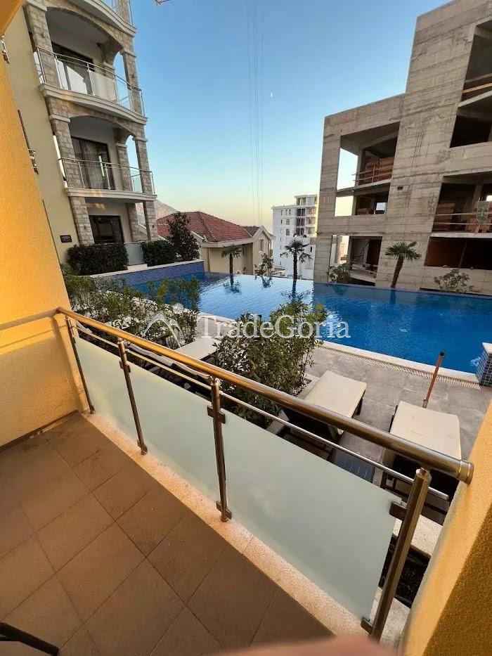 Apartment in a residential complex with a pool, spa, and gym