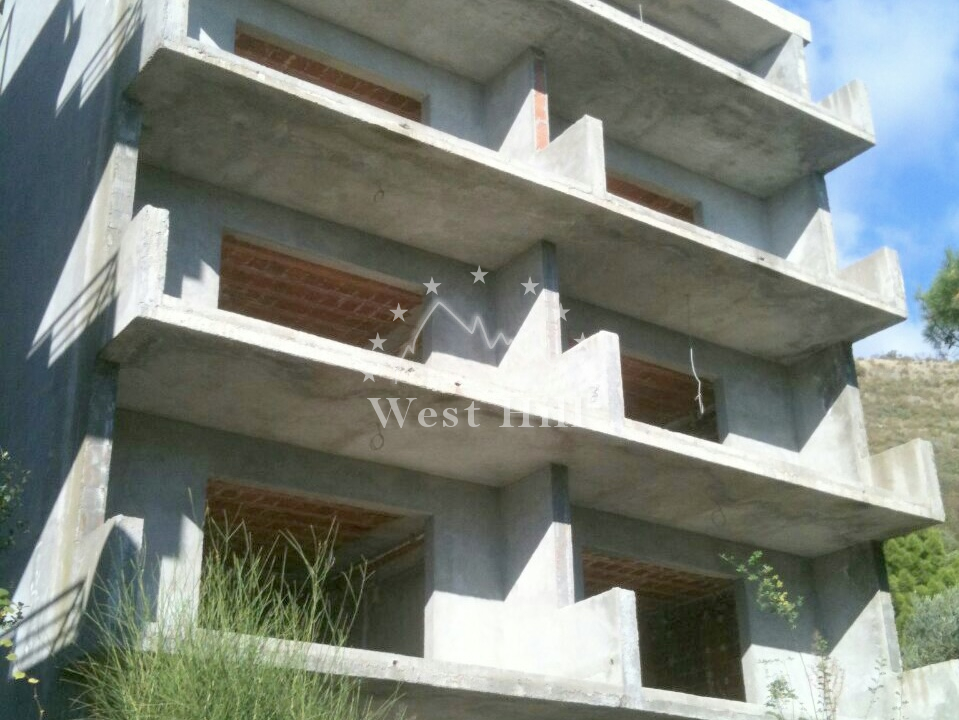Plot with unfinished 9-apartments building with sea view