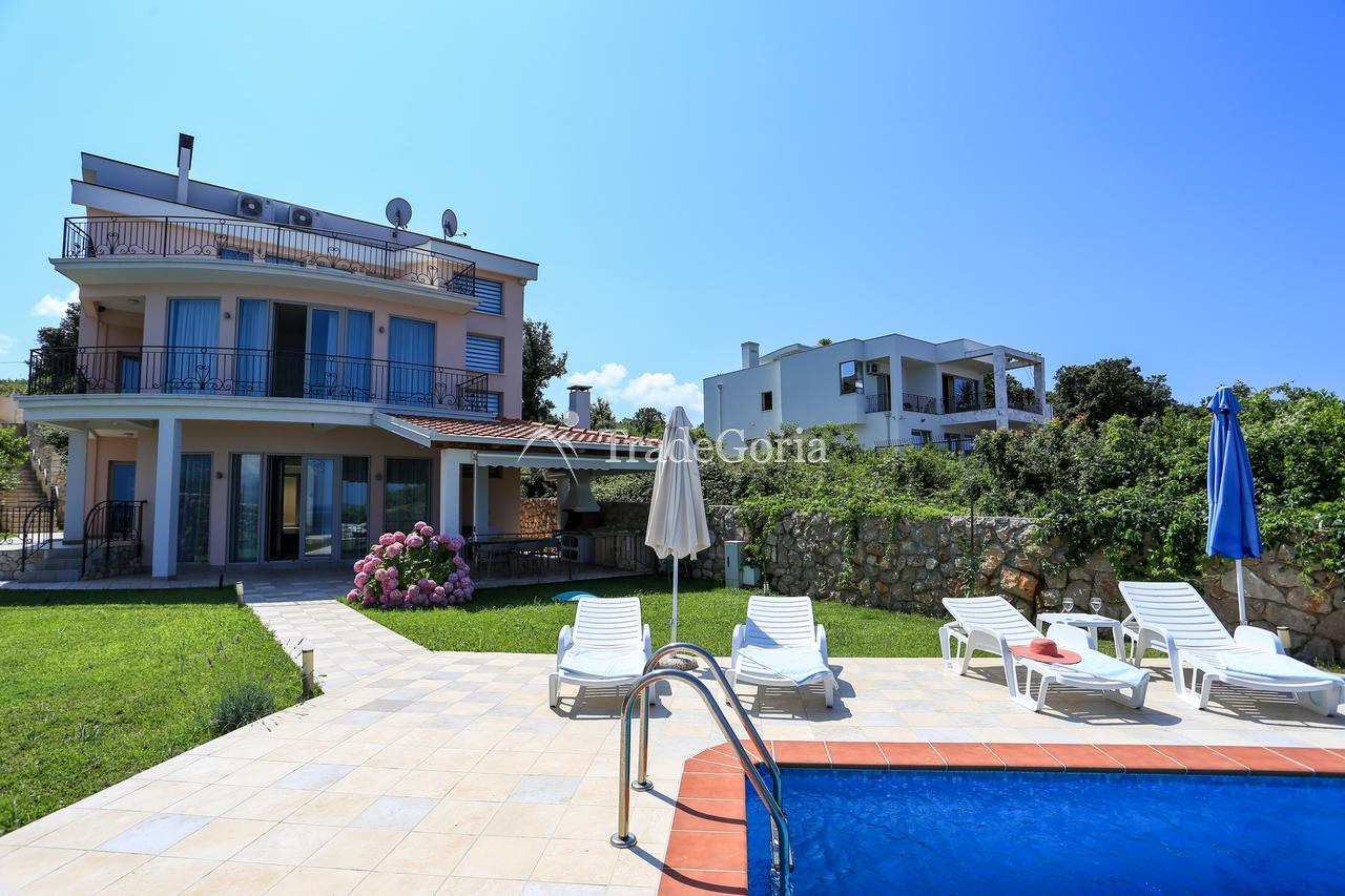 Luxury villa in Utjeha on the first line of the sea with a private beach.