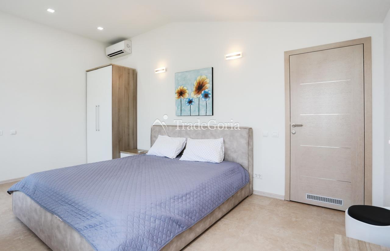 Luxury villa in Utjeha on the first line of the sea with a private beach.