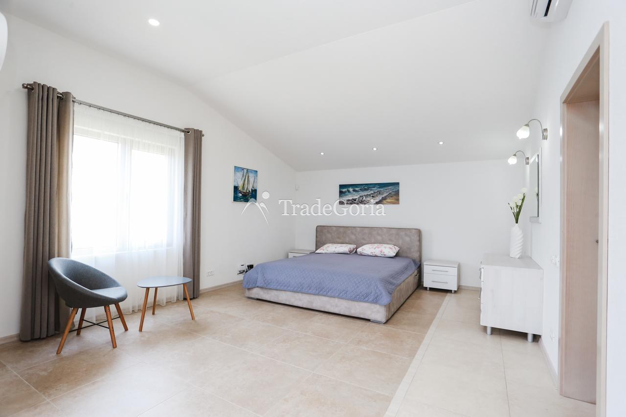 Luxury villa in Utjeha on the first line of the sea with a private beach.