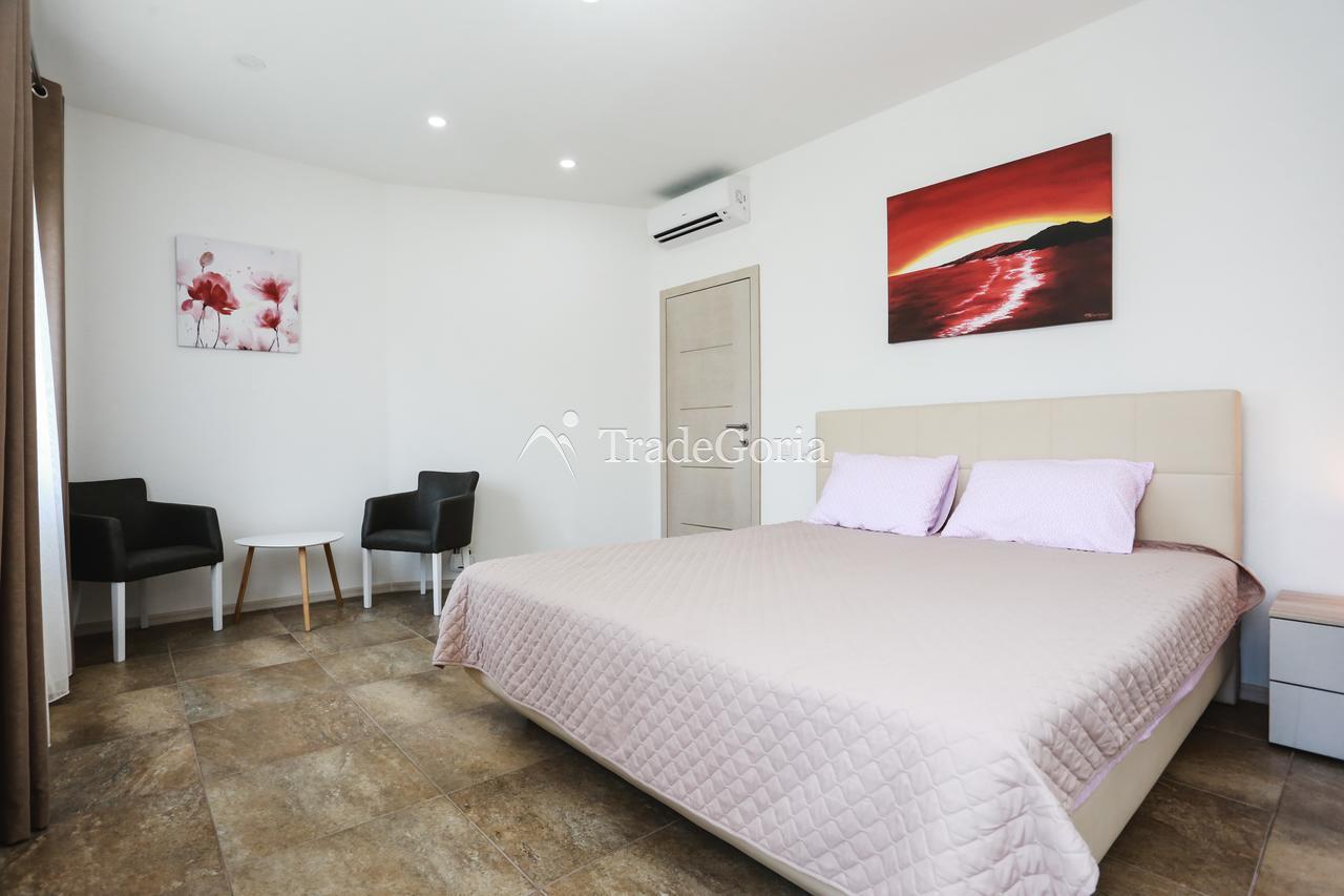 Luxury villa in Utjeha on the first line of the sea with a private beach.