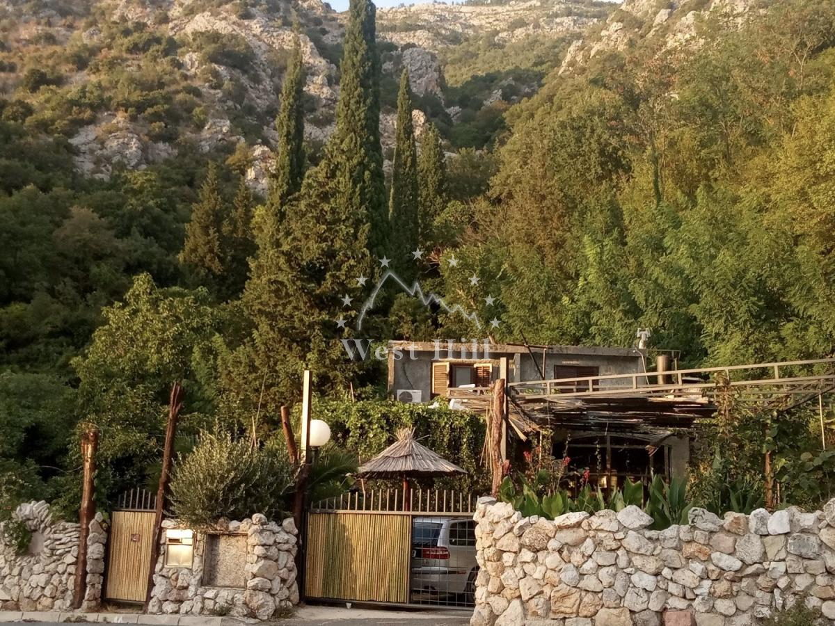 Unique plot with waterfall and house for renovation